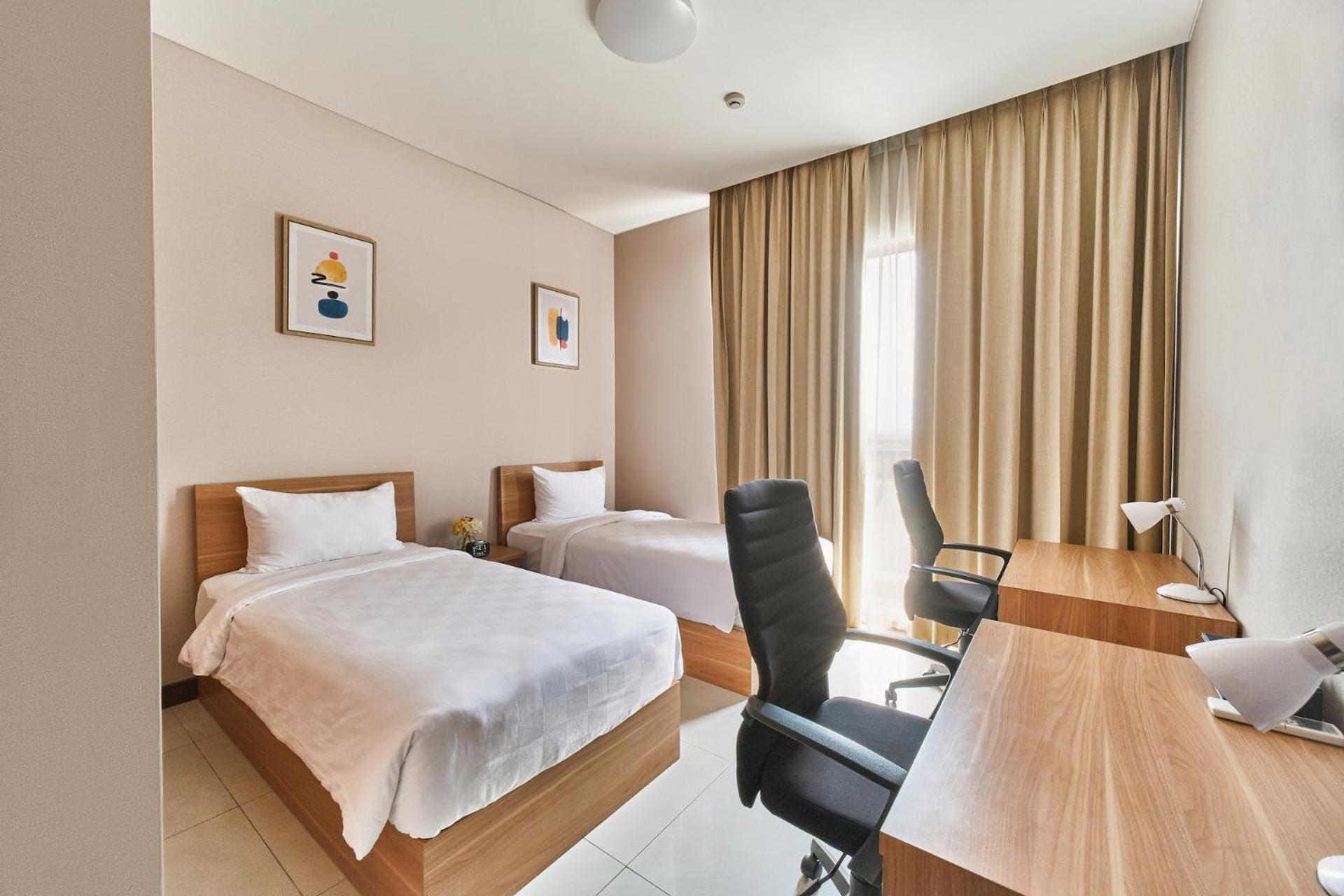 Le Premier Hotel Deltamas Чікаранґ Номер фото